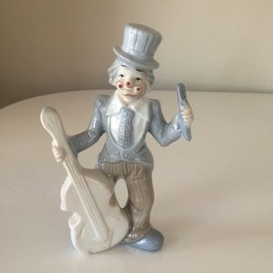 Vintage ceramic porcelain clown with bass guitar